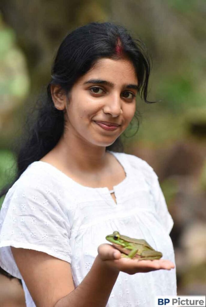 One Girl One Frog Photo